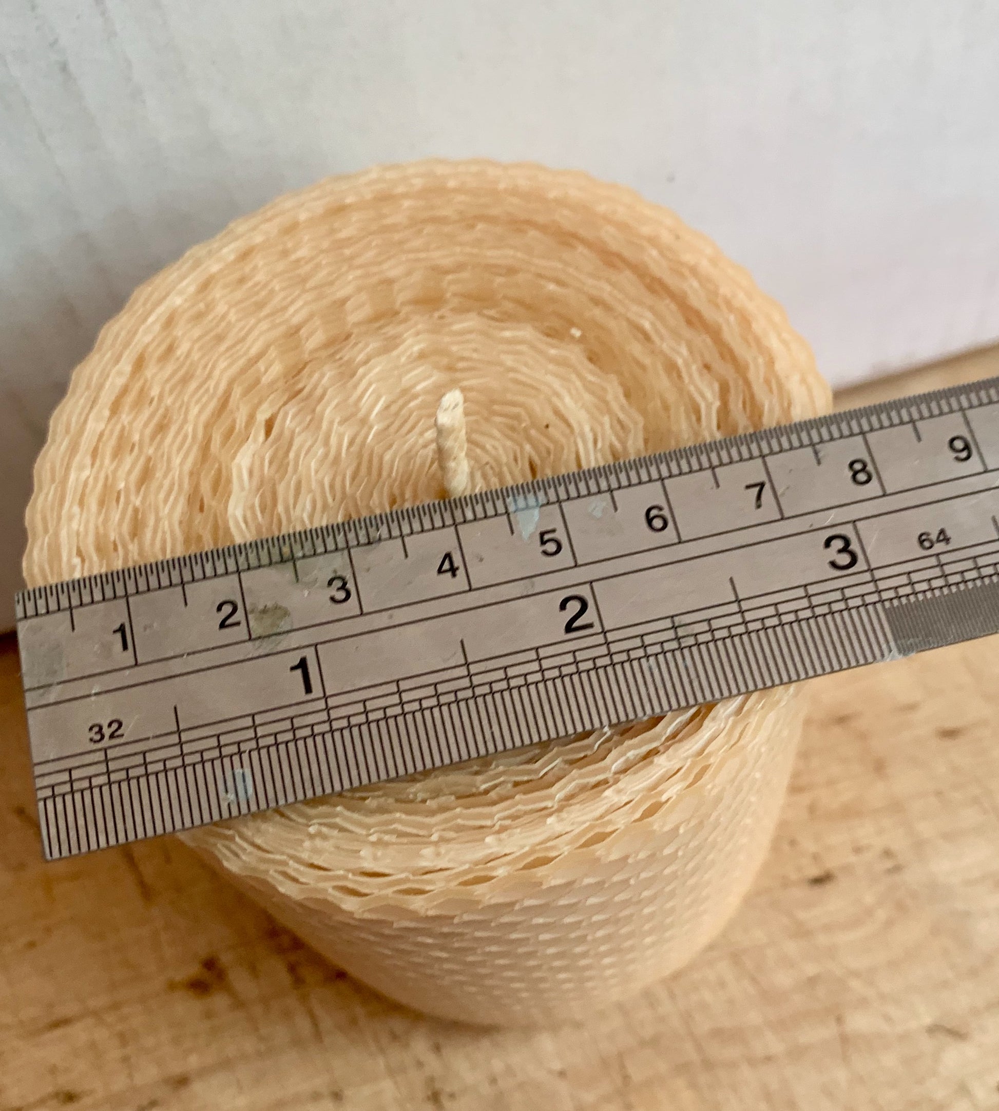 Natural hand rolled beeswax candle