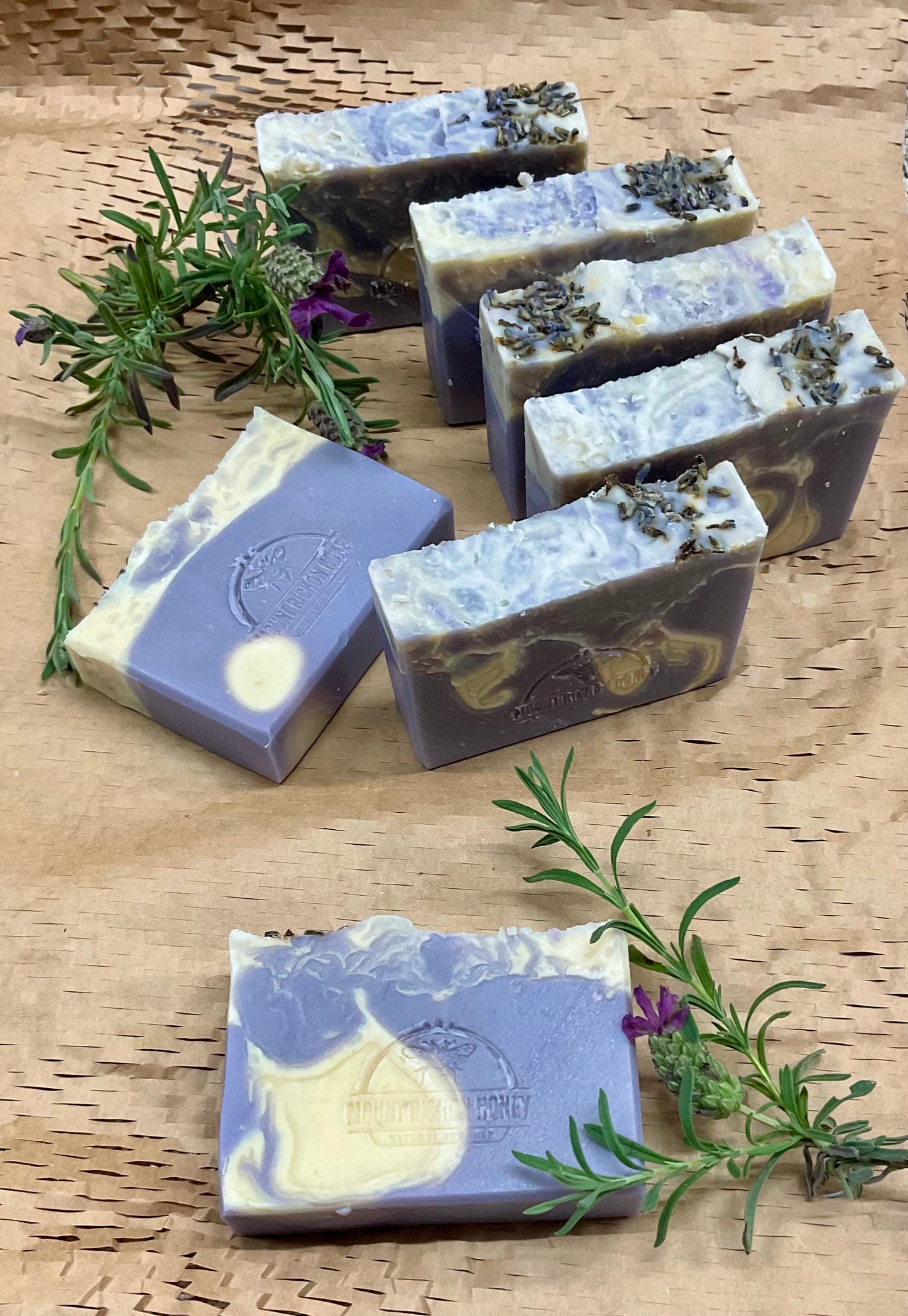 Lavender soap bars with raw honey on rustic timber