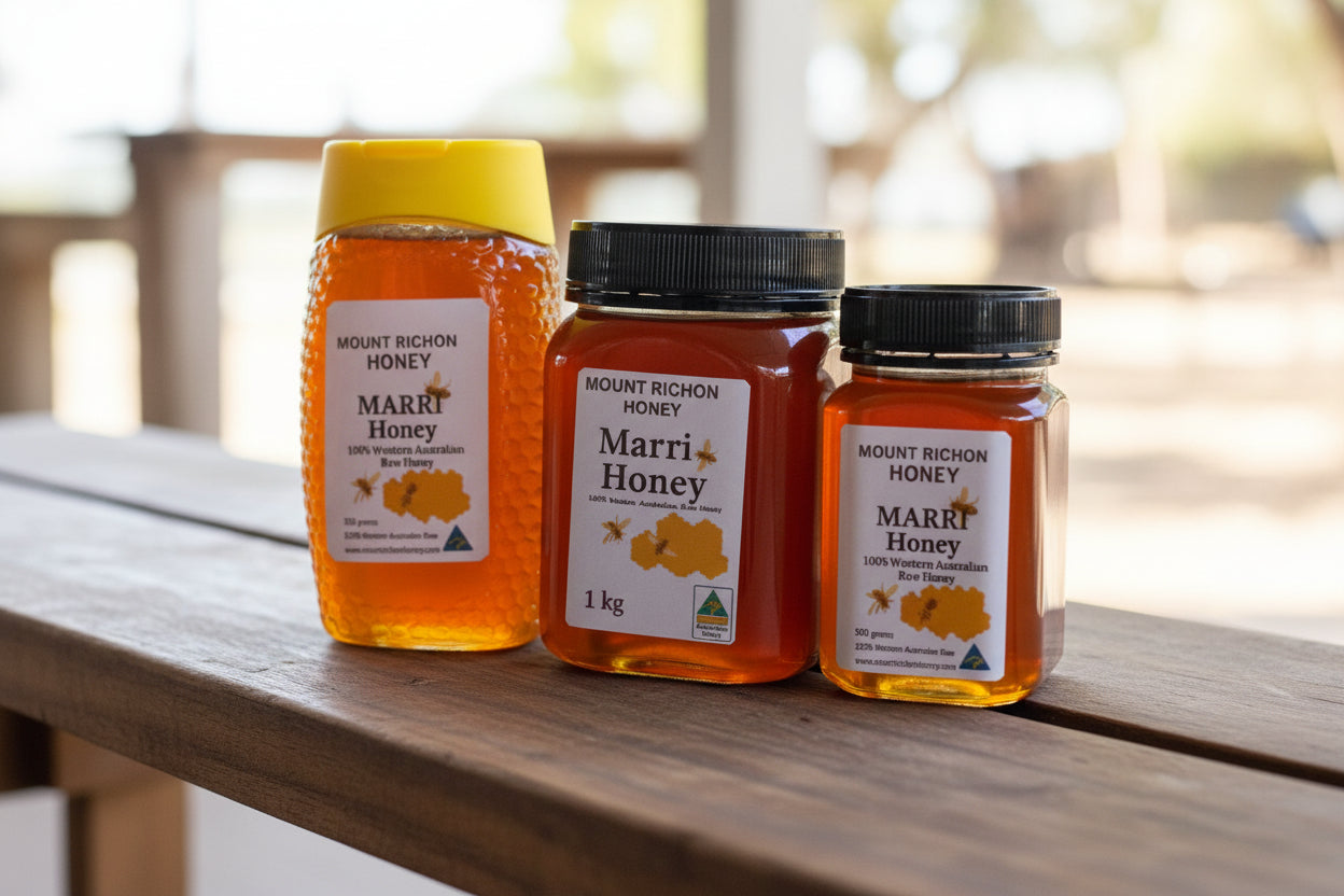 Three jars of Mount Richon Honey on a textured surface
